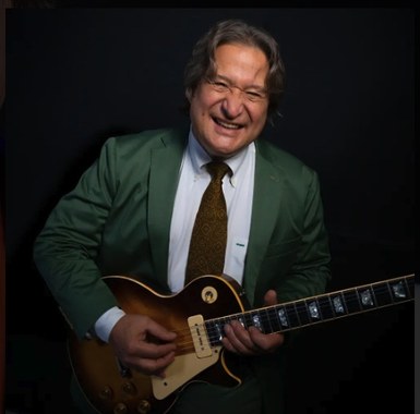 Tim Wolf with guitar